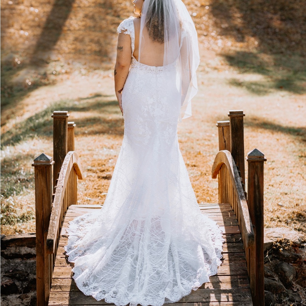 Worn once for photos! Bought for $1600 and veil was $179.